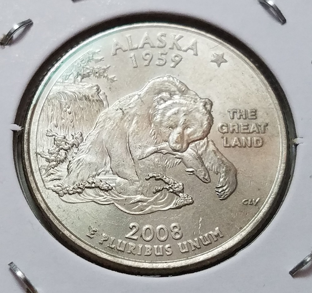 Close-up of 2008 Alaska quarter reverse showing bear claws with the extra sixth claw die break variety visible