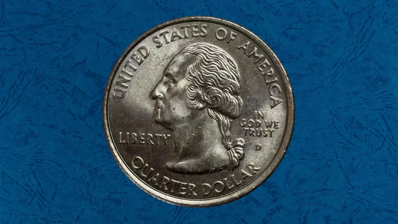 2008 quarter with off-center strike showing Washington portrait shifted with blank crescent area on opposite side